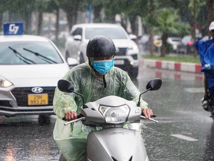 lái xe khi trời mưa - Ảnh 1.